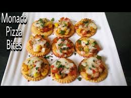 Arrange monaco biscuits on a platter and just before serving top it up with white chickpea hummus. Monaco Bites Monaco Pizza Bites Bite Size Starter From Monaco Biscuits Monaco Biscuit Starter Youtube