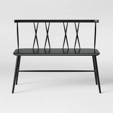 Think wooden designs, such as teak outdoor dining chairs. Becket Metal X Back Dining Bench Black Project 62 Target