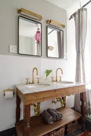 A selection of contrasting storage baskets fill the shelves of this rustic double sink bathroom vanity. How To Know If An Open Bathroom Vanity Is For You