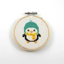 This handsome little fella sports a little pink bowtie to match his rosy cheeks. Penguin Cross Stitch Pattern Cute Penguin Pdf Pattern Modern Cross Stitch Arctic Animal Anima Animal Cross Stitch Patterns Cat Cross Stitches Cross Stitch