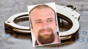 Paraglider crashes into power line, falls into river