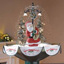 Use as a decorative indoor accent piece for any room. Tabletop Snowing Christmas Tree