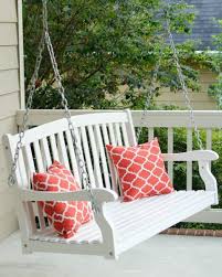 A canvas drop cloth or tarp, some strong cord, and a few long poles provide the basic elements of a canopy. 16 Porch Swing Plans Diy Porch Swing