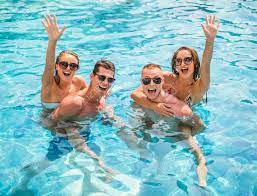 Beautiful Young People Having Fun In Swimming Pool Smiling Stock Photo Picture And Royalty Free Image Image 45032233