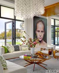 See How Top Designers Used Rugs To Transform These Living Rooms White Furniture Living Room Rugs In Living Room Living Decor