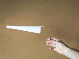 I drew a line on the center crease to make it easier for the kids to see but that is optional. How To Make A Paper Airplane Hgtv