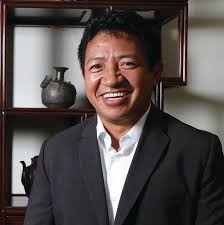 Feds threaten immigration status of foreign investors in Lobsang Dargey's  Everett project