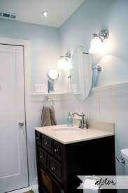 Round Mirror Wall Sconces Lights On Either Side Of Mirror Guest Bathrooms Bathroom Decor Bathrooms Remodel