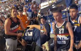 Suns Fan Delivers All Time Great Beatdown To Nuggets Fan With All Time Bad Haircut Whiskey Riff