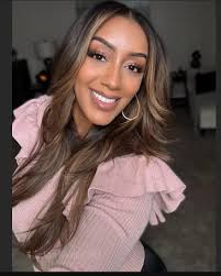 The black woman remains the one who sits