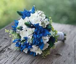 Blue wedding flower bouquet, bridal bouquet, wedding flowers, add pic source on comment and we will update it. Classic Blue Bridal Bouquet Arabia Weddings