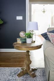 If you've got an upholstered coffee table, like an ottoman, try using a runner to play with patterns. Home Decor 101 How To Decorate End Tables The Turquoise Home