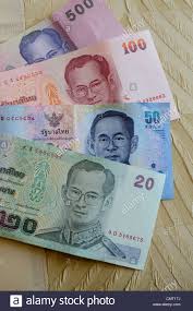 Die thailändische währung heißt baht. Thailand Bangkok Die Thailandische Wahrung Der Baht Stockfotografie Alamy
