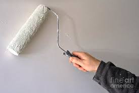 Chat with local pros · top rated professionals · find local pros Painter Painting A House Wall With A Paint Roller Photograph By Olivier Le Queinec
