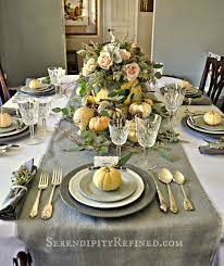 The thanksgiving table is always set with finesse to include elegant dinnerware, artfully folded napkins, and a personal touch in the place card to guide each guest to their place setting.at the center of the table is the centerpiece.for thanksgiving, a centerpiece can be foraged from outdoor materials—fallen leaves, seasonal flowers, or gourds and pumpkins (many of which are abundant at. Remarkable Thanksgiving Table Decor Photos Decoration Inspirations Serend Thanksgiving Table Decorations Thanksgiving Table Settings Rustic Thanksgiving Table