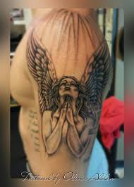 This will be a perfect tattoo for female and male tattoo lovers as well. Praying Angel Tattoo Angel Tattoo Designs Angel Tattoo Angel Wings Tattoo