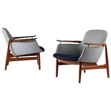 Finn Juhl A Pair Of Nv 53 Armchairs From Niels Vodder With Makers Stamp Armchair Vintage Armchair Classic Wing Chair