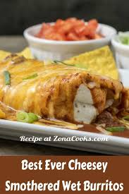 Best Ever Smothered Wet Burritos Have A Ground Beef And Refried Bean Filling Wrapped In A Large Wet Burrito Recipes Cubed Beef Recipes Bean And Cheese Burrito