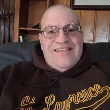 What was the name of the bait and tackle store next to Bill's barber shop  in Kimberly, WI?