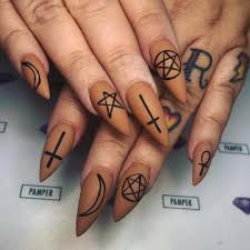Blush and 'millennial pink' are so last years. P This Matte Burnt Orange Nail Art Is Supreme P Photo 54 Witch Nail Art Ideas To Enchant And Delight You Revelist