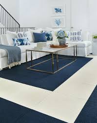 Hide a beautiful design with a piece of furniture. Create Custom Flooring With Carpet Tiles Area Rugs By Flor