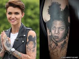 On the front or side of the neck, it's available for all to see. Ruby Rose S 48 Tattoos Meanings Steal Her Style