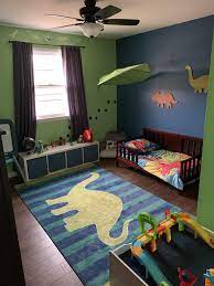 Its Not A Pirate Ship Bed Or A Castle But Pretty Proud Of How Our 2 Year Olds Dino Room Turned Out Dadd Toddler Boy Room Themes Toddler Rooms Boy Room Themes
