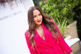 The masked singer returned this week with a surprise tuesday night episode. Is Adrienne Bailon The Flamingo On The Masked Singer