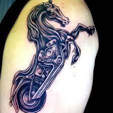 With an occasional exception, most motorcycle tattoo designs are made for larger portions of the body: 1 Motorcycle Tattoo Ideas