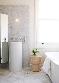 The seats come in different sizes, designs and materials that can be matched to the bathroom décor, and many models are foldable to save space. Little Luxury 30 Bathrooms That Delight With A Side Table For The Bathtub