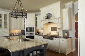 Love The Colors Cream Cabinets Baby Blue Walls And Darker Blue Island With Clue Acce Antique White Kitchen Cabinets Antique White Kitchen Traditional Kitchen