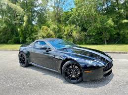 Image result for Onyx Black 2011 Aston Martin