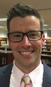 District Names Two Key Administrators