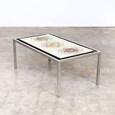 It lets you create a warm and inviting look with your favorite decor, collectibles, potted plants etc. Handpainted Coffee Table By Juliette Belarti 1960s 78838