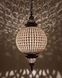 How romantic would it be to lie on the couch and listen to the waves with the spots of light dancing on the ceiling like stars? Moroccan Style Ceiling Lights Moroccan Bazaar Ceiling Lights Brass Pendant Lamp Ball Pendant Lighting