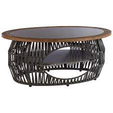 But outdoors, a coffee table often plays more than a supporting role. Grey Stone And Wood Outdoor Coffee Table