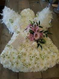 As such, they tend to take on a theme and may showcase the image of a pair of. Funeral Flowers In Shrewsbury
