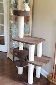 Armarkat Premium Carpeted Cat Tree Model F5502 14d X 36w X 54h Coffee Brown Read More Reviews Cat Tree Designs Cat Tree Scratching Post Modern Cat Furniture
