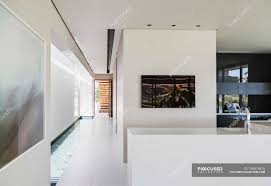 The prominence of modern kitchen design in the entertainment industry has also contributed to this trend. Corridor And Kitchen In Modern House Interior Domestic Life Daylight Stock Photo 199874476