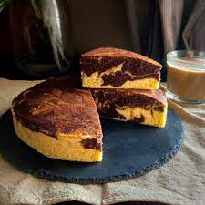 This Marble Cake Is Soft And Fluffy With A Nice Balance Of The Chocolate And Butter Cake Portions Delightfull Marble Cake Recipes Hot Milk Cake Baking Recipes