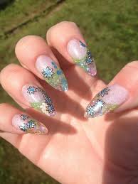 Here are some cute nails. 45 Most Beautiful Almond Shaped Acrylic Nail Art Design Ideas