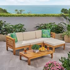 Wooden cushion sofa set are available in various materials such as wood, cane, bamboo and soft sets, to cater to unique aesthetic choices and provide ultimate comfort to the user. Teak And Dark Teal Makayla Ana Outdoor 3 Seater Acacia Wood Sofa Sectional With Cushions Patio Seating Patio Lawn Garden Fcteutonia05 De