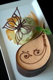 Thai Tea Mousse In Chocolate Teardrop With Mint Ice Cream In A Tuile Cup Mousse Dessert Dessert Presentation Fancy Desserts