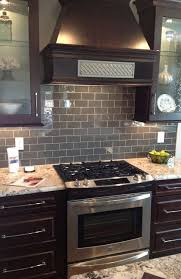 This bright backsplash is modern and fun and the company began in 2011 pay less for granite and has been transforming homes since 2011 with its expertise as a kitchen countertop. Choosing Backsplash Tile For Busy Granite Countertops Toni Schefer Design