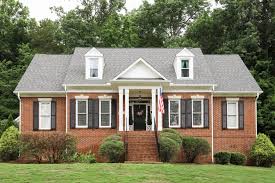 White vinyl windows are generally the least expensive, standard option too. Our Brick House Exterior Makeover White Trim Black Shutters