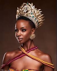 Faith Maria Porter – Miss Grand Ghana 2025 Faith Maria Porter is a dynamic,  trailblazing creative whose influence spans the worlds of pageantry,  performing arts, fashion, and entertainment. Crowned Miss Grand Ghana