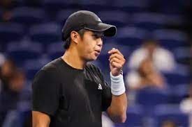 Who is Learner Tien's coach? Grand Slam champion Michael Chang