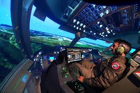 Mike Pohl Founder Of A C E S Flight Simulation Takes One Of His Mall Of America Flight Simulators For A Spin P Flight Simulator Mall Of America Tech Gifts