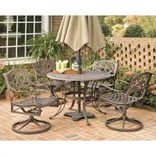 The chairs will stack for convenient storage in limited spaces. Biscayne Black 48 Inch Round Outdoor Dining Table By Home Styles Dining Tables Patio Lawn Garden Ohmychalk Com