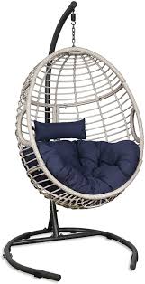 The large vibrant colored polyester pad easily ties on to the frame provides a comfortable place to rest. Patio Tree Outdoor Basket Swing Chair Hanging Tear Drop Egg Chair With Stand Navy In 2021 Swinging Chair Hammock Chair Stand Hanging Egg Chair